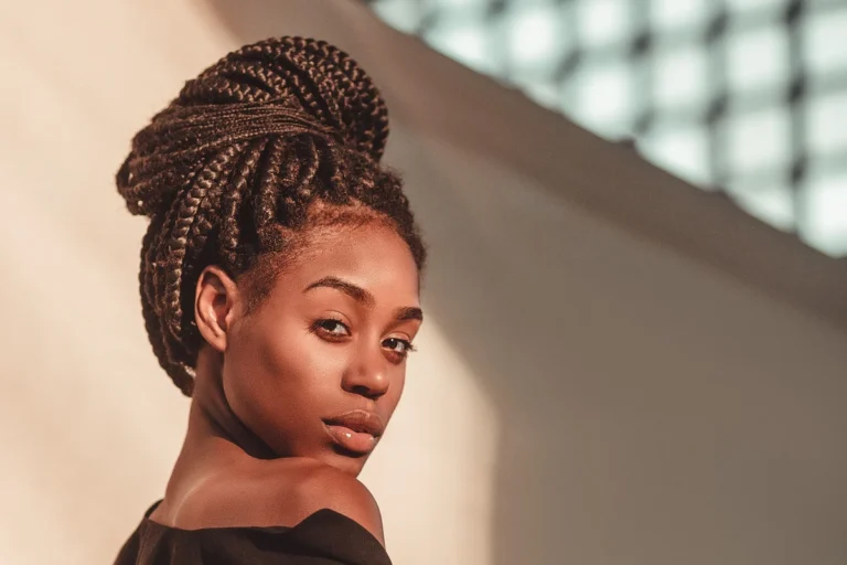 Woman with a braided bun hairstyle