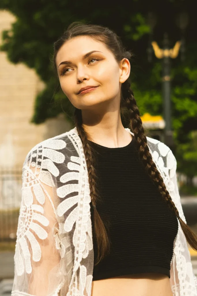 Two symmetrical braids styled on either side of the head