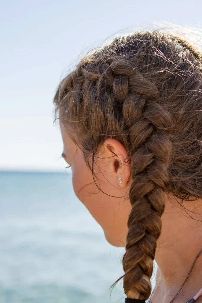 Raised Dutch braid running along the back of the head